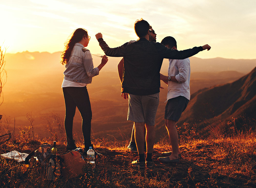 Group of people at the sunset